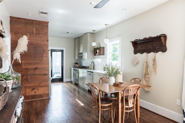 108 E 27th St, Houston, TX 77008 - dining room with dark wood-style floors, baseboards, and recessed lighting