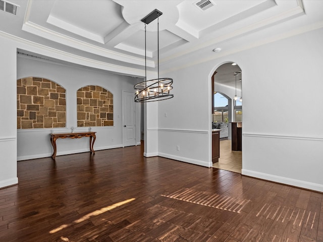 913 Ember Hills Ln, Friendswood, TX 77546 - unfurnished dining area featuring coffered ceiling, wood finished floors, a chandelier, arched walkways, and crown molding