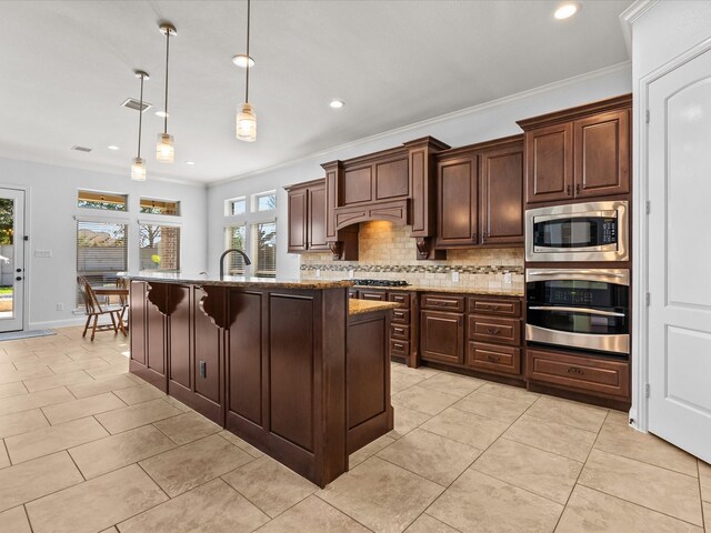913 Ember Hills Ln, Friendswood, TX 77546 - kitchen featuring stainless steel appliances, tasteful backsplash, recessed lighting, light stone counters, and light tile patterned floors