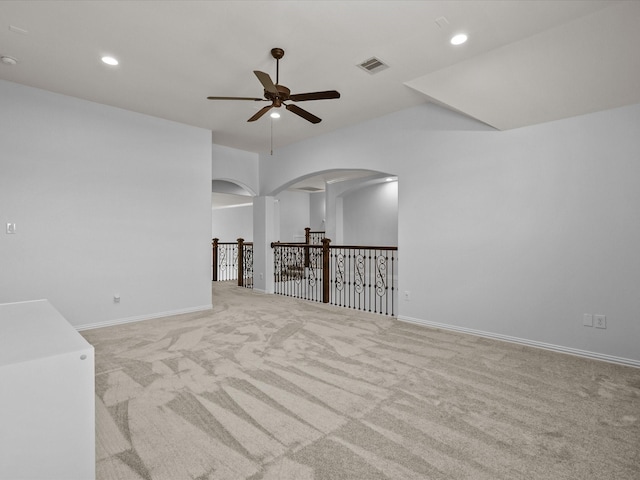913 Ember Hills Ln, Friendswood, TX 77546 - carpeted spare room featuring a ceiling fan, arched walkways, recessed lighting, and baseboards