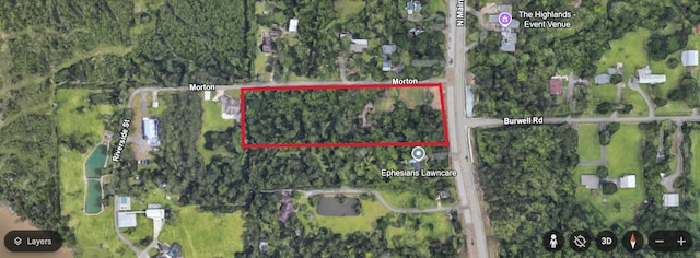 1408 N Main St, Highlands, TX 77562 - aerial overview of property's location featuring property boundaries highlighted
