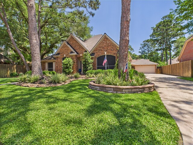 4210 Rock Springs Dr, Houston, TX 77345 - traditional-style house with brick siding and a garage