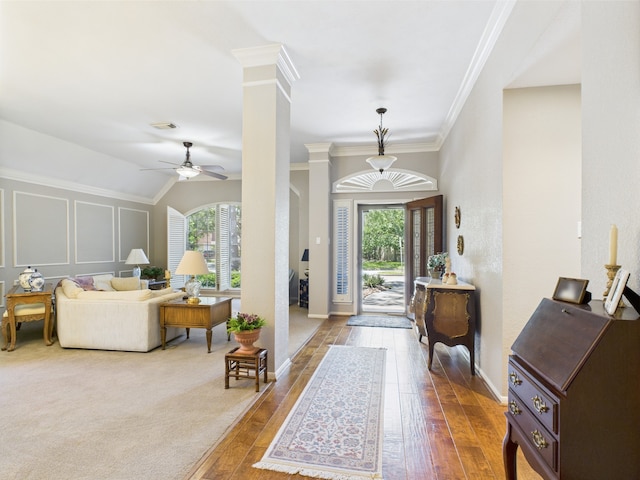 4210 Rock Springs Dr, Houston, TX 77345 - foyer featuring healthy amount of natural light, ornamental molding, dark wood-style floors, a ceiling fan, and baseboards