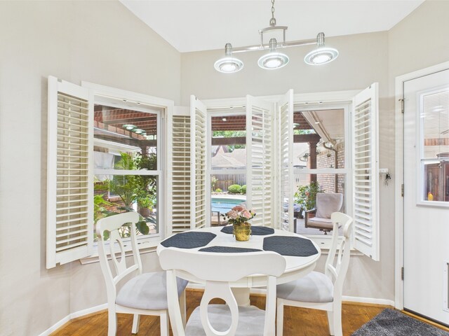 4210 Rock Springs Dr, Houston, TX 77345 - dining room with baseboards and wood finished floors