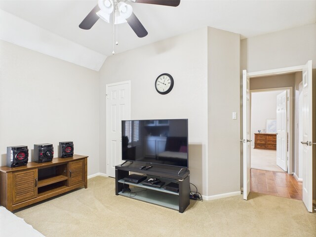 4210 Rock Springs Dr, Houston, TX 77345 - carpeted living area with a ceiling fan, baseboards, and lofted ceiling
