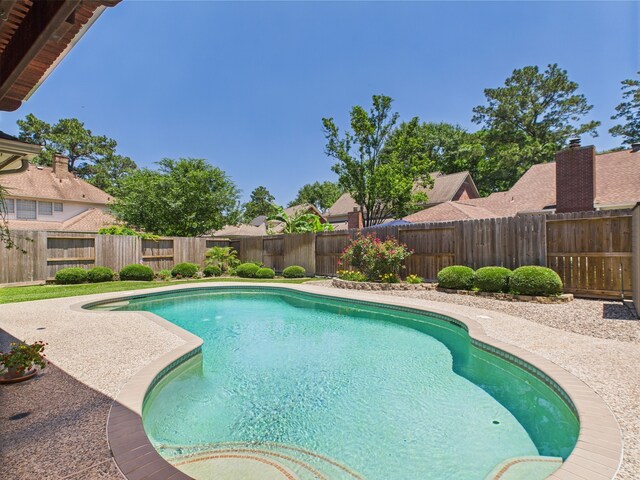 4210 Rock Springs Dr, Houston, TX 77345 - view of pool with a fenced backyard