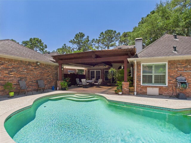 4210 Rock Springs Dr, Houston, TX 77345 - view of swimming pool featuring a patio