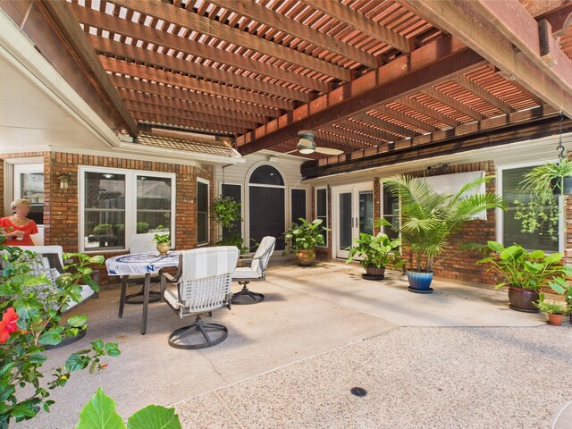 4210 Rock Springs Dr, Houston, TX 77345 - view of patio with outdoor dining area, a pergola, and french doors