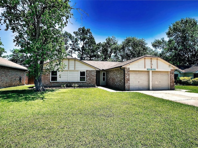 21510 N Tangle Creek Ln, Spring, TX 77388 - ranch-style home with an attached garage, a front yard, brick siding, and concrete driveway