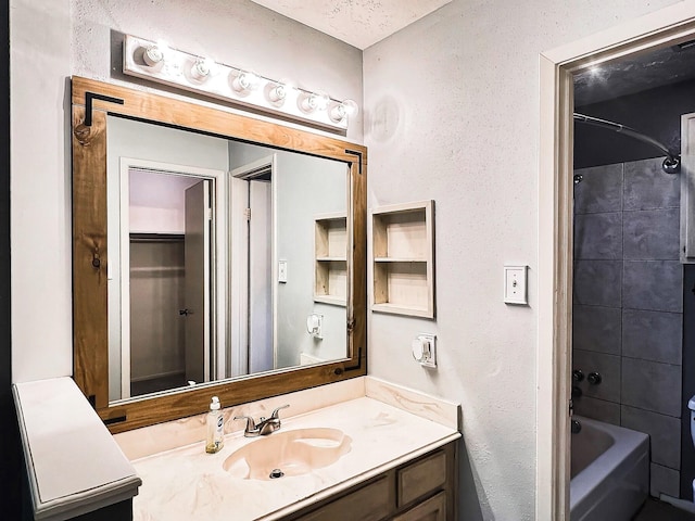 21510 N Tangle Creek Ln, Spring, TX 77388 - bathroom featuring vanity and shower / washtub combination