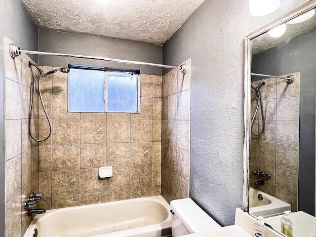 21510 N Tangle Creek Ln, Spring, TX 77388 - bathroom featuring shower / washtub combination, a textured wall, toilet, and a textured ceiling