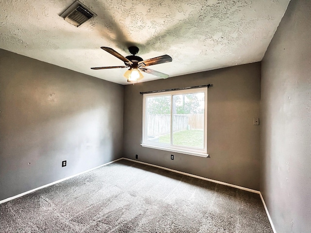 21510 N Tangle Creek Ln, Spring, TX 77388 - unfurnished room with carpet, baseboards, ceiling fan, and a textured ceiling