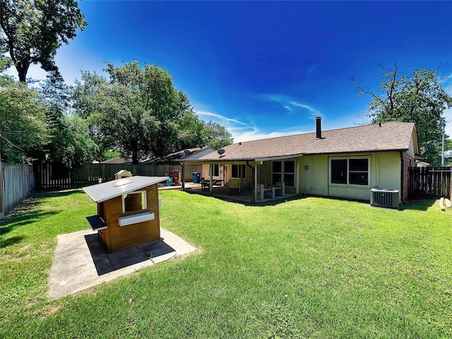 21510 N Tangle Creek Ln, Spring, TX 77388 - back of house with a patio area and central AC unit