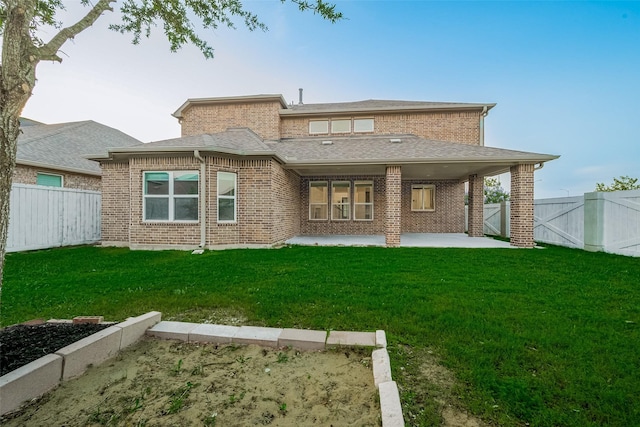 707 Fresh Sage Xing, Richmond, TX 77406 - back of property with a patio area, brick siding, and a gate