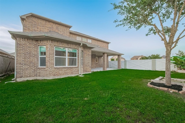 707 Fresh Sage Xing, Richmond, TX 77406 - rear view of house featuring brick siding