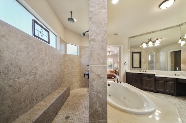 7106 Sentinel Fls, Missouri City, TX 77459 - bathroom featuring ensuite bathroom, a walk in shower, a tub with jets, and vanity