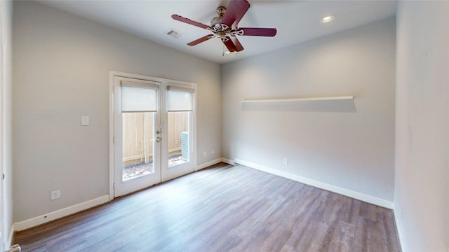 1913 Hickory St, Houston, TX 77007 - unfurnished room with a ceiling fan, wood finished floors, baseboards, and recessed lighting