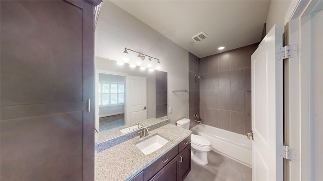 1913 Hickory St, Houston, TX 77007 - full bath featuring toilet, shower / washtub combination, tile patterned flooring, and vanity