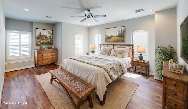1913 Hickory St, Houston, TX 77007 - bedroom with multiple windows, baseboards, recessed lighting, and wood finished floors