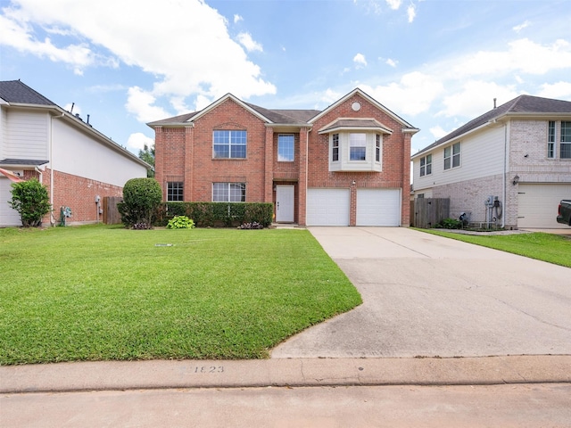 11823 Elizabeth Ct, Pinehurst, TX 77362 - view of front of house with brick siding, a garage, concrete driveway, and a front yard
