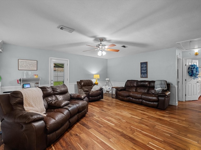 3628 Avenue E 1/2 Ave E 1/2, Santa Fe, TX 77510 - living area with attic access, hardwood / wood-style floors, a ceiling fan, and a textured ceiling
