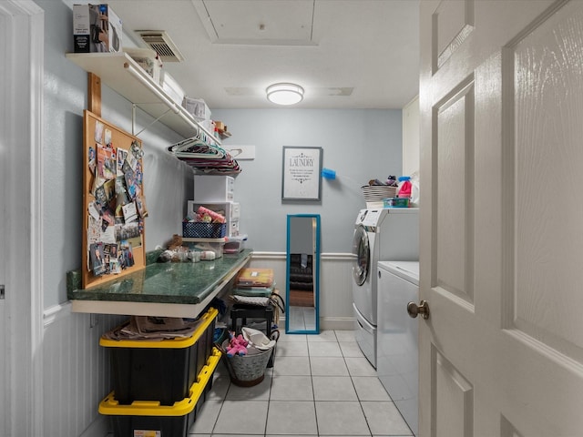 3628 Avenue E 1/2 Ave E 1/2, Santa Fe, TX 77510 - clothes washing area featuring washer and clothes dryer, light tile patterned flooring, and attic access