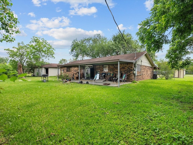 3628 Avenue E 1/2 Ave E 1/2, Santa Fe, TX 77510 - rear view of property featuring a patio and brick siding