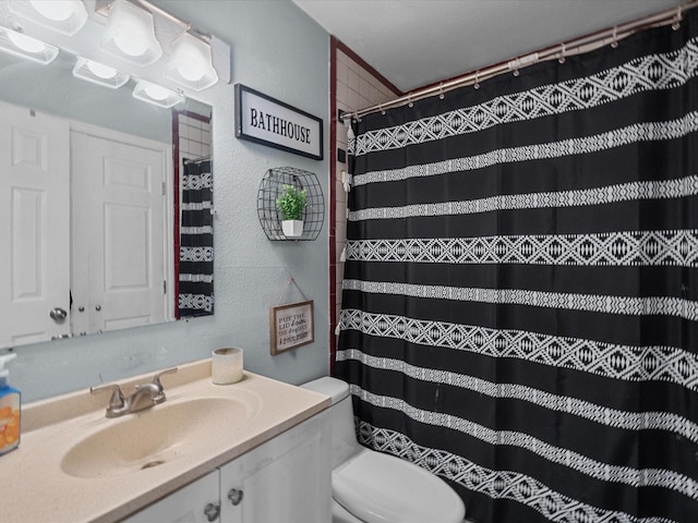 3628 Avenue E 1/2 Ave E 1/2, Santa Fe, TX 77510 - full bath featuring toilet, vanity, a shower with curtain, and a textured wall