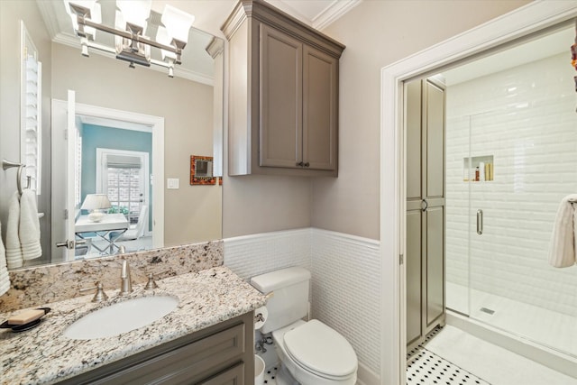 3923 Drake St, Houston, TX 77005 - full bath featuring a shower stall, ornamental molding, toilet, vanity, and a wainscoted wall