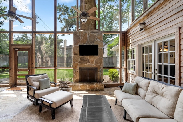 3803 Sunset Blvd, West University Place, TX 77005 - sunroom with a ceiling fan, an outdoor living space with a fireplace, and french doors