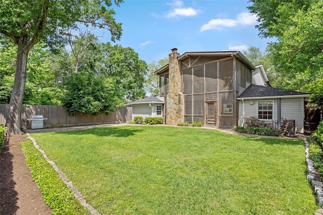 3803 Sunset Blvd, West University Place, TX 77005 - rear view of property featuring a sunroom and a chimney