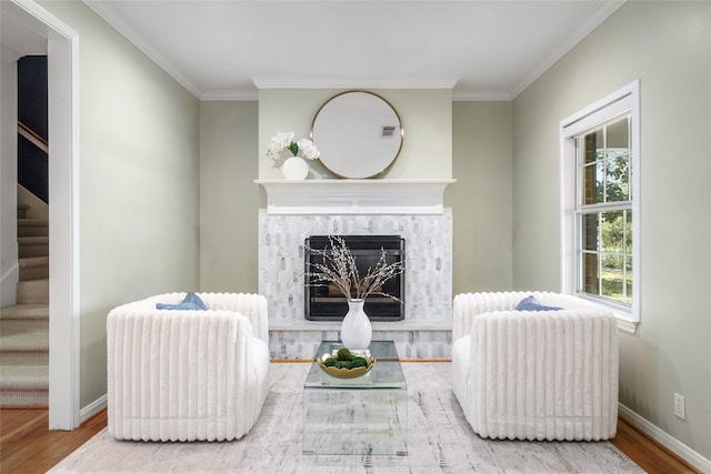 3803 Sunset Blvd, West University Place, TX 77005 - living area with wood finished floors, ornamental molding, stairway, a high end fireplace, and baseboards