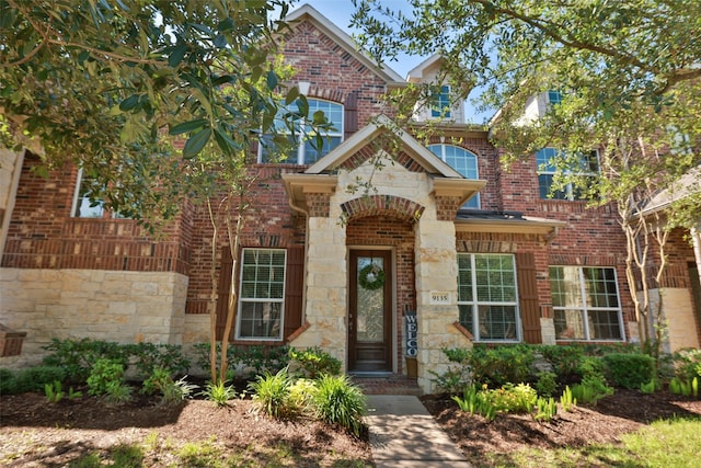 9135 Solvista Pass Ln, Houston, TX 77070 - view of front of property featuring stone siding and brick siding