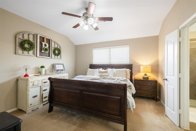 9135 Solvista Pass Ln, Houston, TX 77070 - bedroom with light colored carpet, vaulted ceiling, ceiling fan, and baseboards