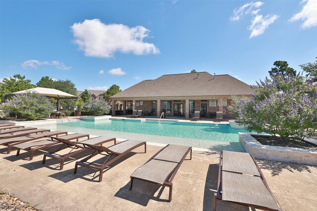 9135 Solvista Pass Ln, Houston, TX 77070 - community pool featuring a patio area