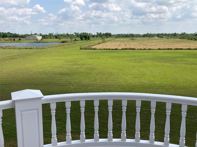 2709 Flores Bayou Bridge Rd, Angleton, TX 77515 - view of green lawn featuring a water view and a view of rural / pastoral area