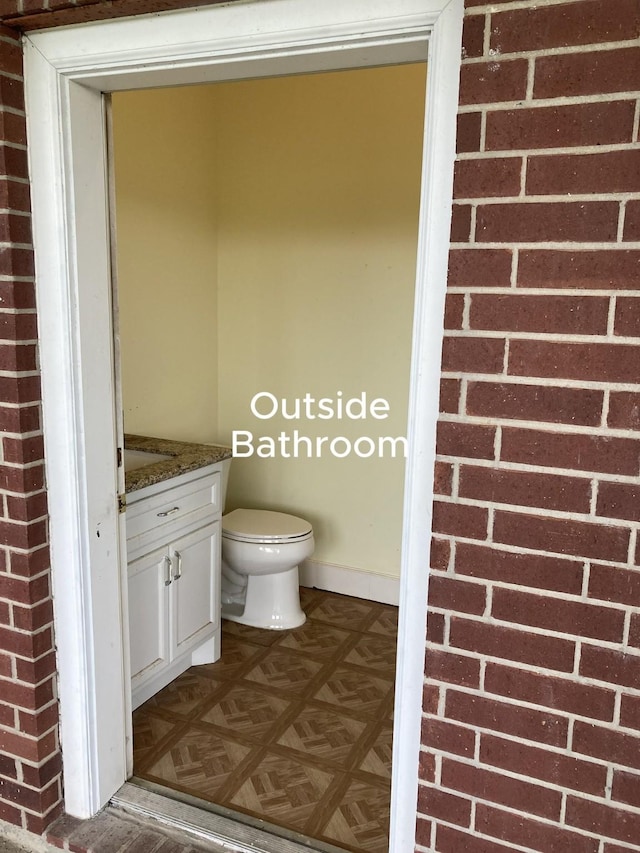 2709 Flores Bayou Bridge Rd, Angleton, TX 77515 - half bathroom featuring vanity and toilet