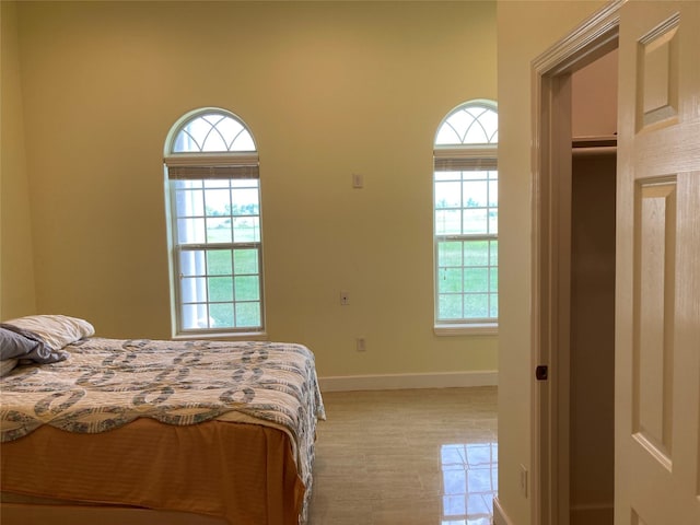 2709 Flores Bayou Bridge Rd, Angleton, TX 77515 - bedroom with baseboards