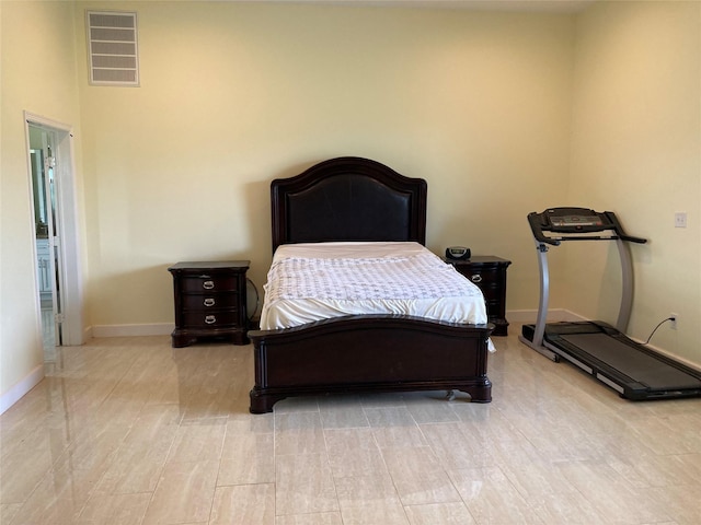 2709 Flores Bayou Bridge Rd, Angleton, TX 77515 - bedroom with baseboards and light wood finished floors
