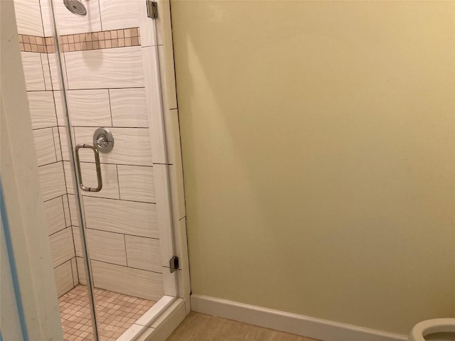 2709 Flores Bayou Bridge Rd, Angleton, TX 77515 - full bathroom with baseboards, a shower stall, and toilet