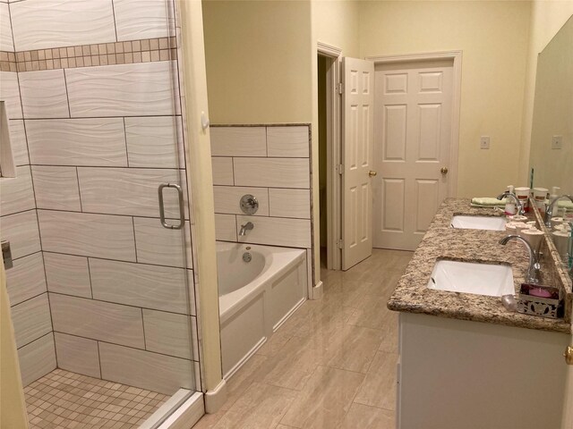 2709 Flores Bayou Bridge Rd, Angleton, TX 77515 - full bathroom featuring a shower stall, a bath, and double vanity