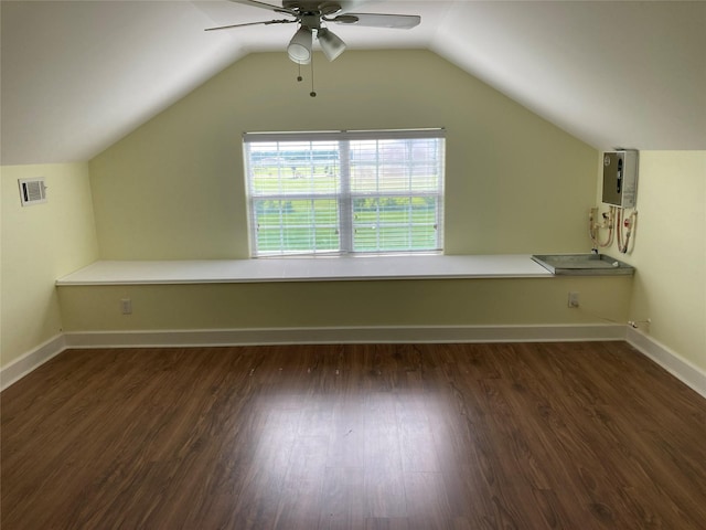 2709 Flores Bayou Bridge Rd, Angleton, TX 77515 - additional living space featuring ceiling fan, wood finished floors, lofted ceiling, baseboards, and electric panel