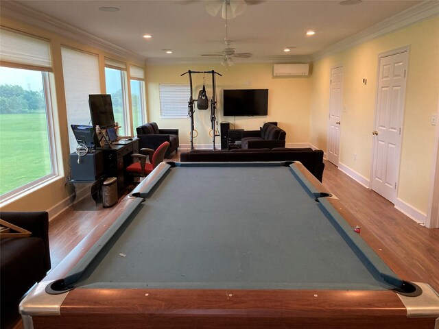 2709 Flores Bayou Bridge Rd, Angleton, TX 77515 - playroom with crown molding, wood finished floors, baseboards, a ceiling fan, and billiards