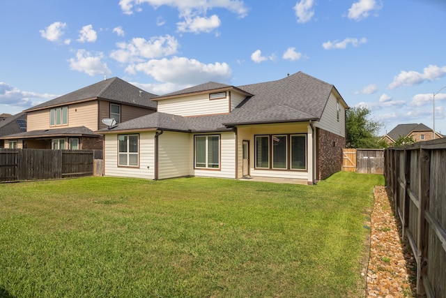 15314 Ashbrook Dove Ln, Cypress, TX 77429 - back of house with a shingled roof and brick siding
