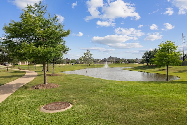 15314 Ashbrook Dove Ln, Cypress, TX 77429 - view of community with a water view, a lawn, and a residential view