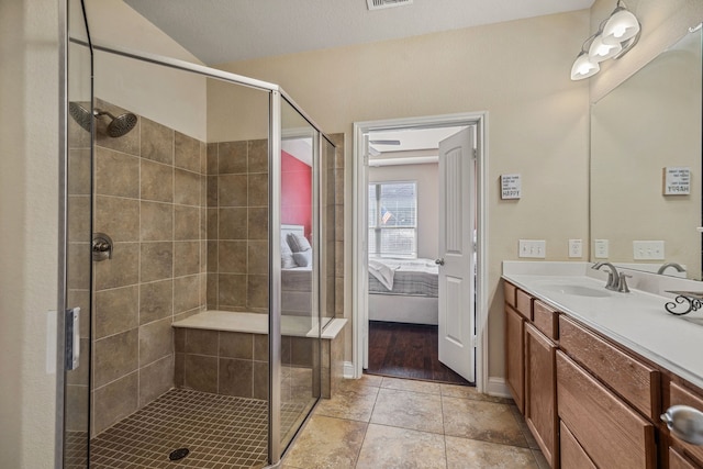 15314 Ashbrook Dove Ln, Cypress, TX 77429 - ensuite bathroom with a shower stall, vanity, and baseboards