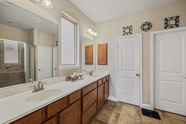 15314 Ashbrook Dove Ln, Cypress, TX 77429 - full bath featuring a shower stall, double vanity, and baseboards
