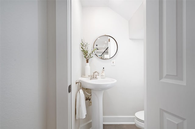 1728 Nicholson St, Houston, TX 77008 - bathroom featuring toilet and vaulted ceiling