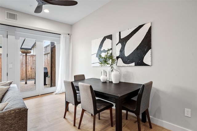 1728 Nicholson St, Houston, TX 77008 - dining space with light wood-style floors, a ceiling fan, and baseboards