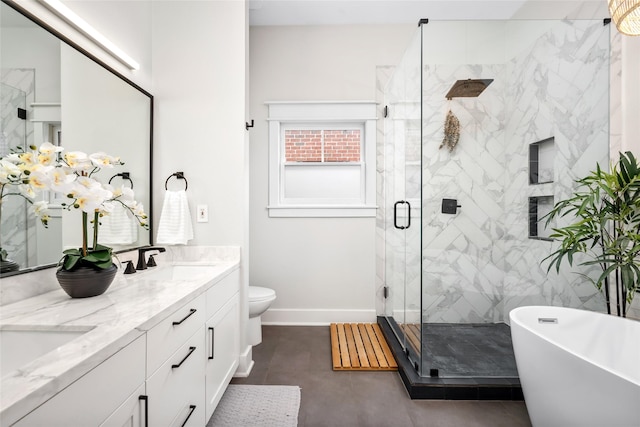 1728 Nicholson St, Houston, TX 77008 - bathroom featuring a stall shower, baseboards, a freestanding tub, double vanity, and toilet